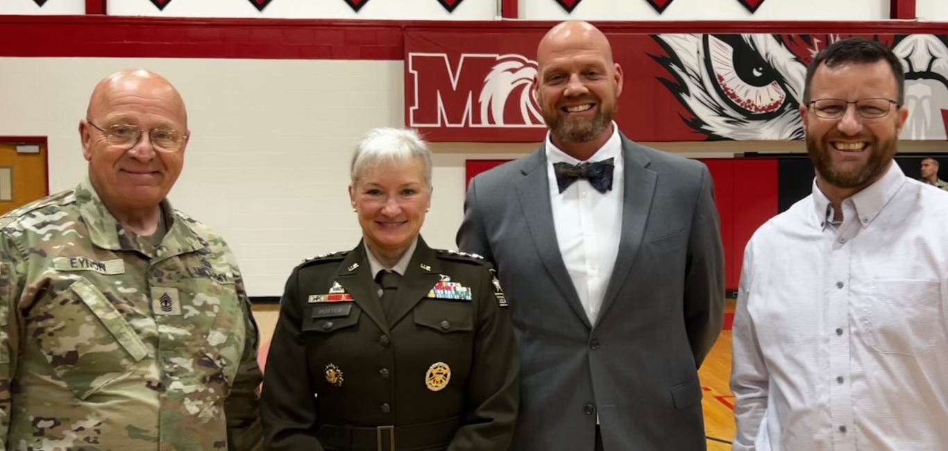 Superintendent posing with a 5-star army general