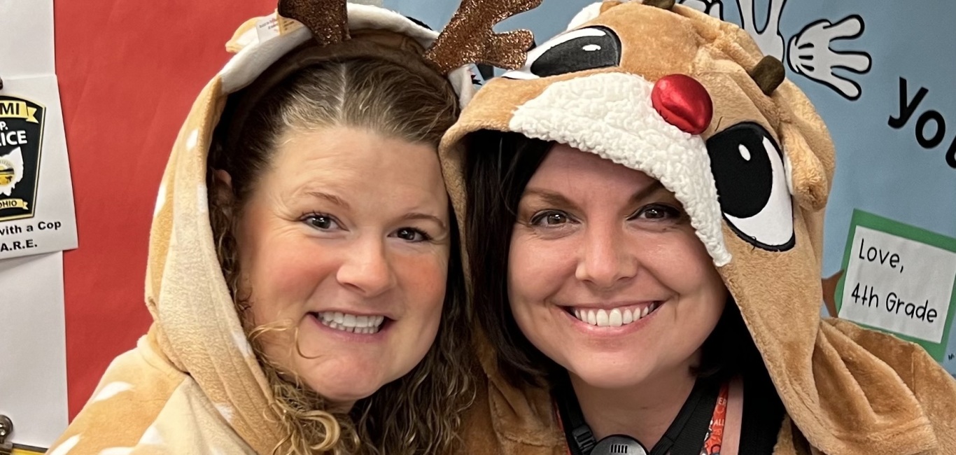 teachers in reindeer outfits before winter break